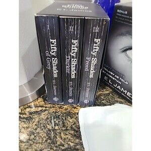 The Fifty Shades Trilogy by EL James Box Set in paperback volume 1,2,3.